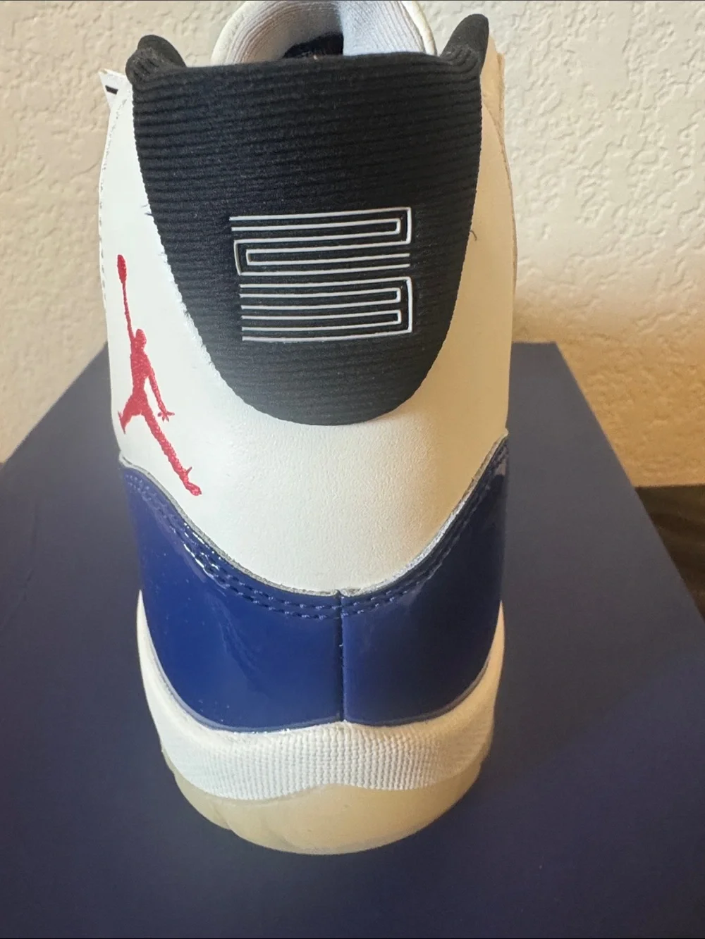Air Jordan 11 Retro Rare Air mens White/Royal Blue/Red Sneakers